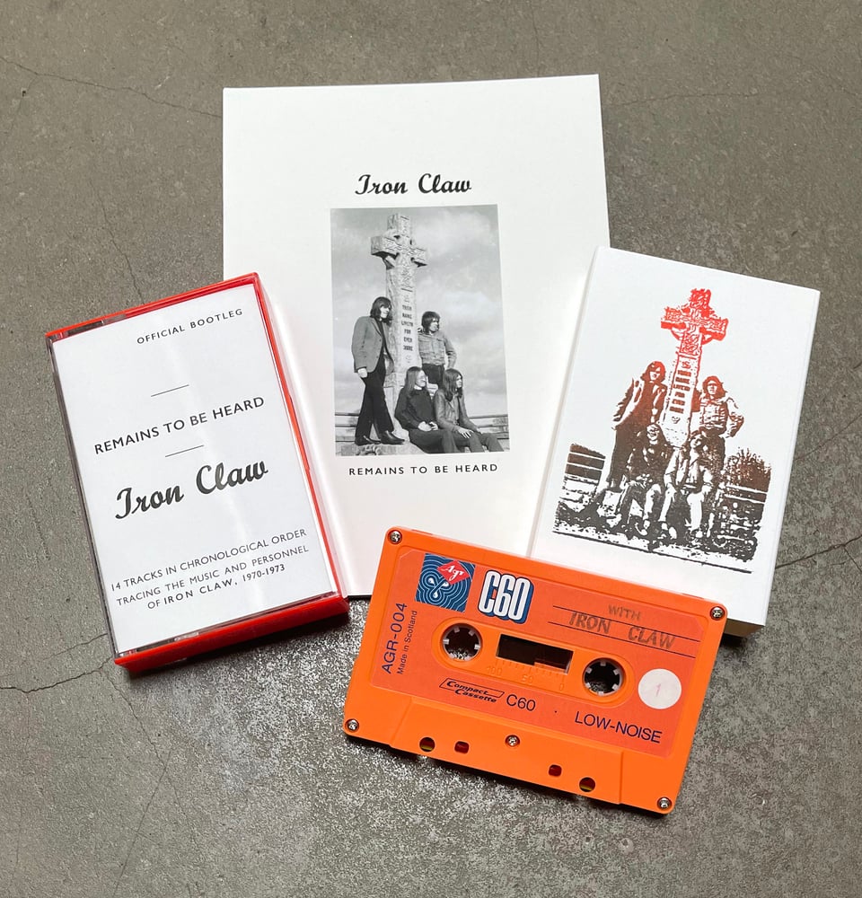 IRON CLAW - REMAINS TO BE HEARD [CASSETTE + 40 PAGE ART BOOK] -- ORANGE BLANK DESIGN -ED. OF 35